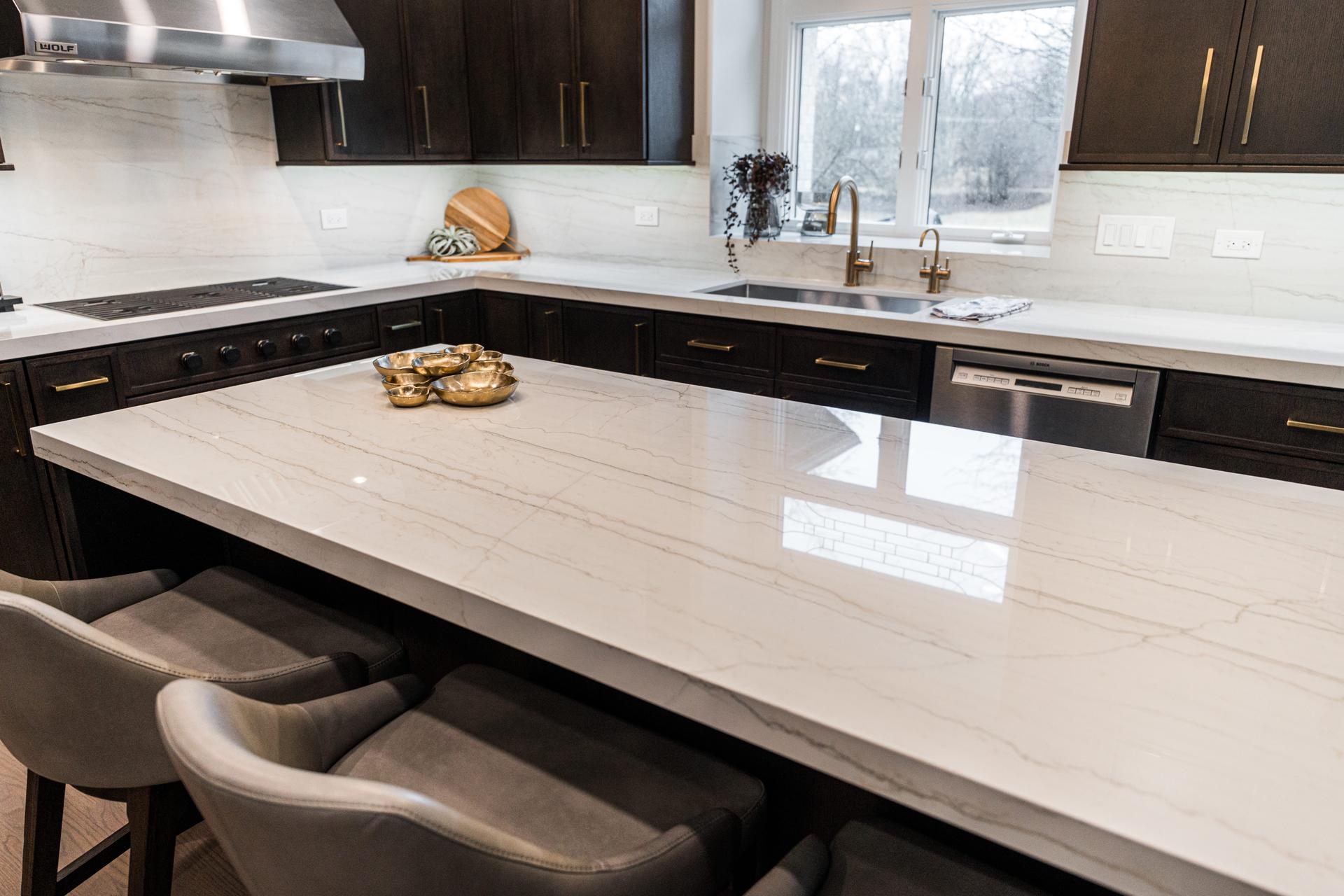 Foxtrail Naperville — full kitchen view showing open layout after peninsula removal and beam installation