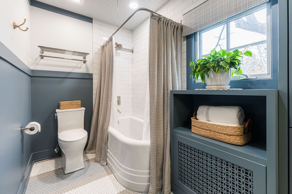 Fulton Geneva — boy's bathroom full view with painted cabinetry, brass fixtures, and custom millwork details
