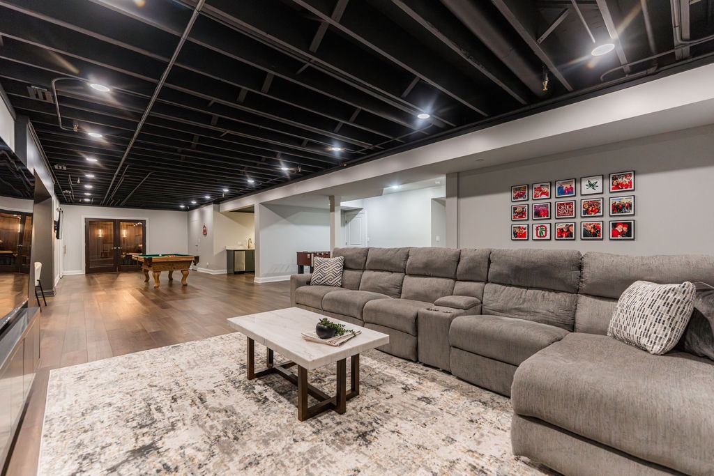 Yorkshire Oakbrook — full basement open-plan view showing foosball, lounge, and bar zones