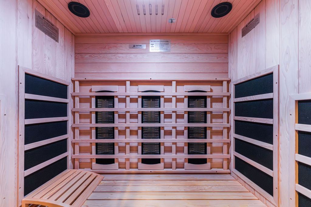 Yorkshire Oakbrook — library arched entertainment wall with built-in TV and ambient lighting