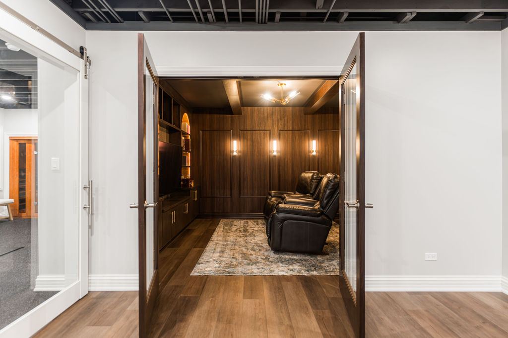 Yorkshire Oakbrook — library arched niche detail with brass accents and custom cabinetry