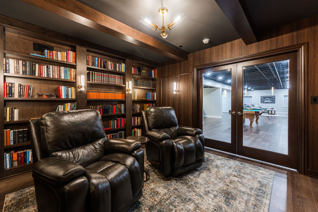 Yorkshire Oakbrook — lounge and game room showing full open-plan basement transformation